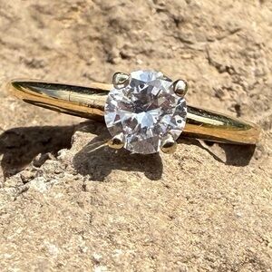 Elegant Diamond Set In 14 Karat Gold Solitaire Ring